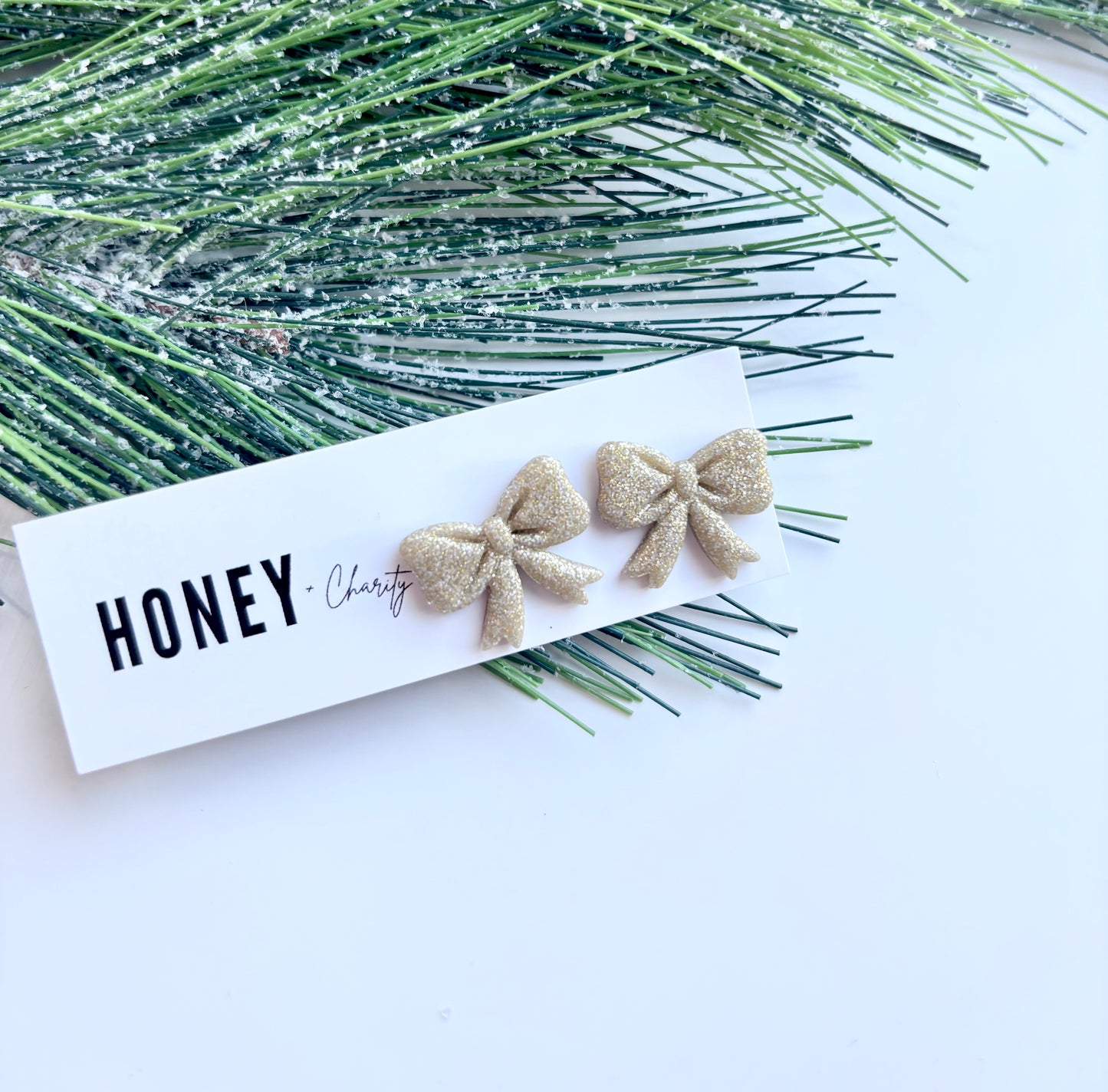 Gold Sparkle Bow Studs