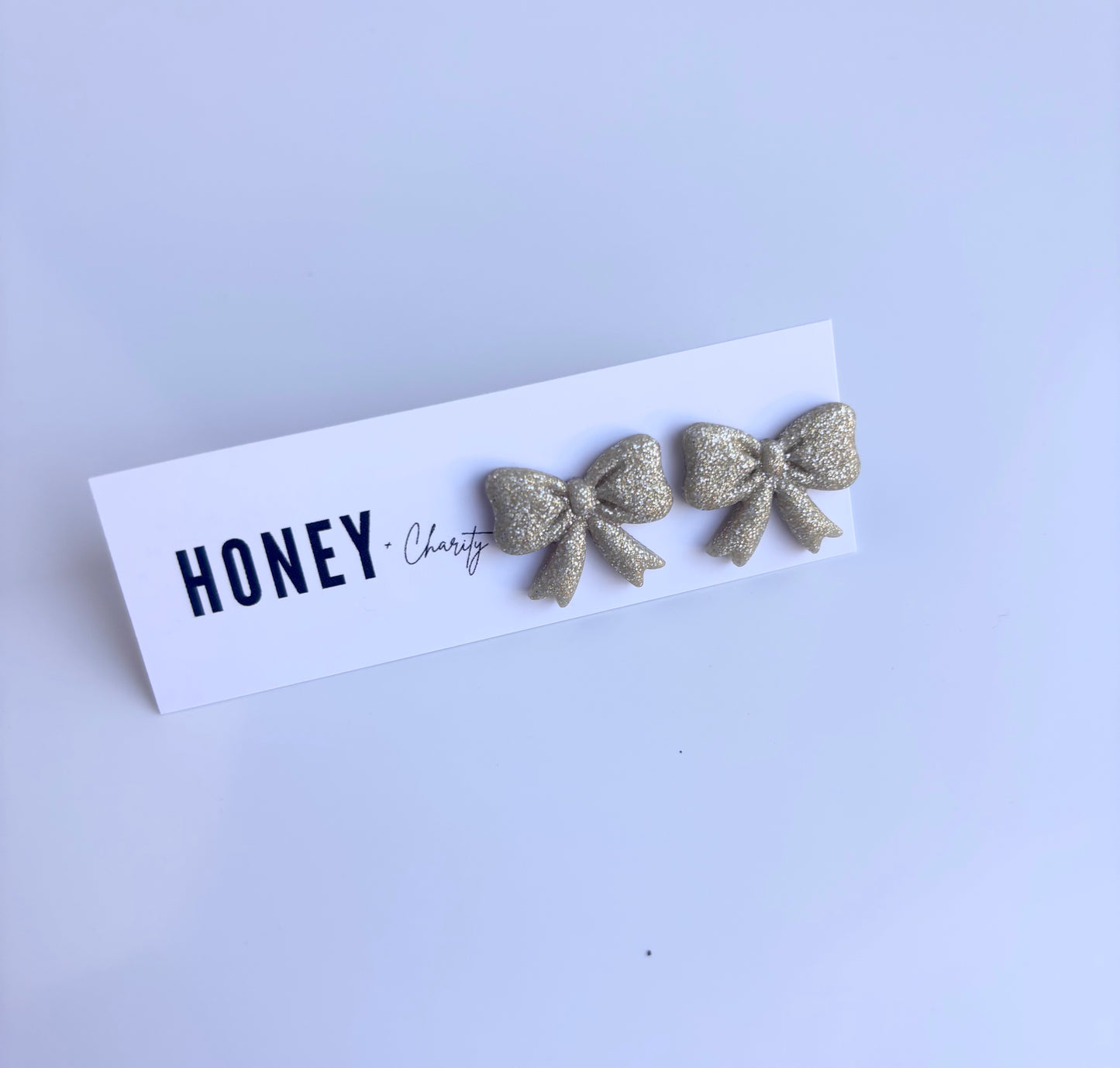 Gold Sparkle Bow Studs