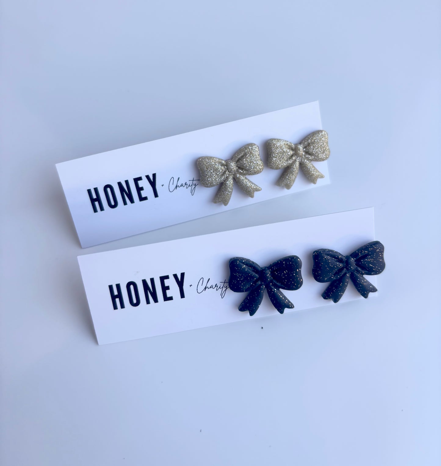 Black Sparkle Bow Studs