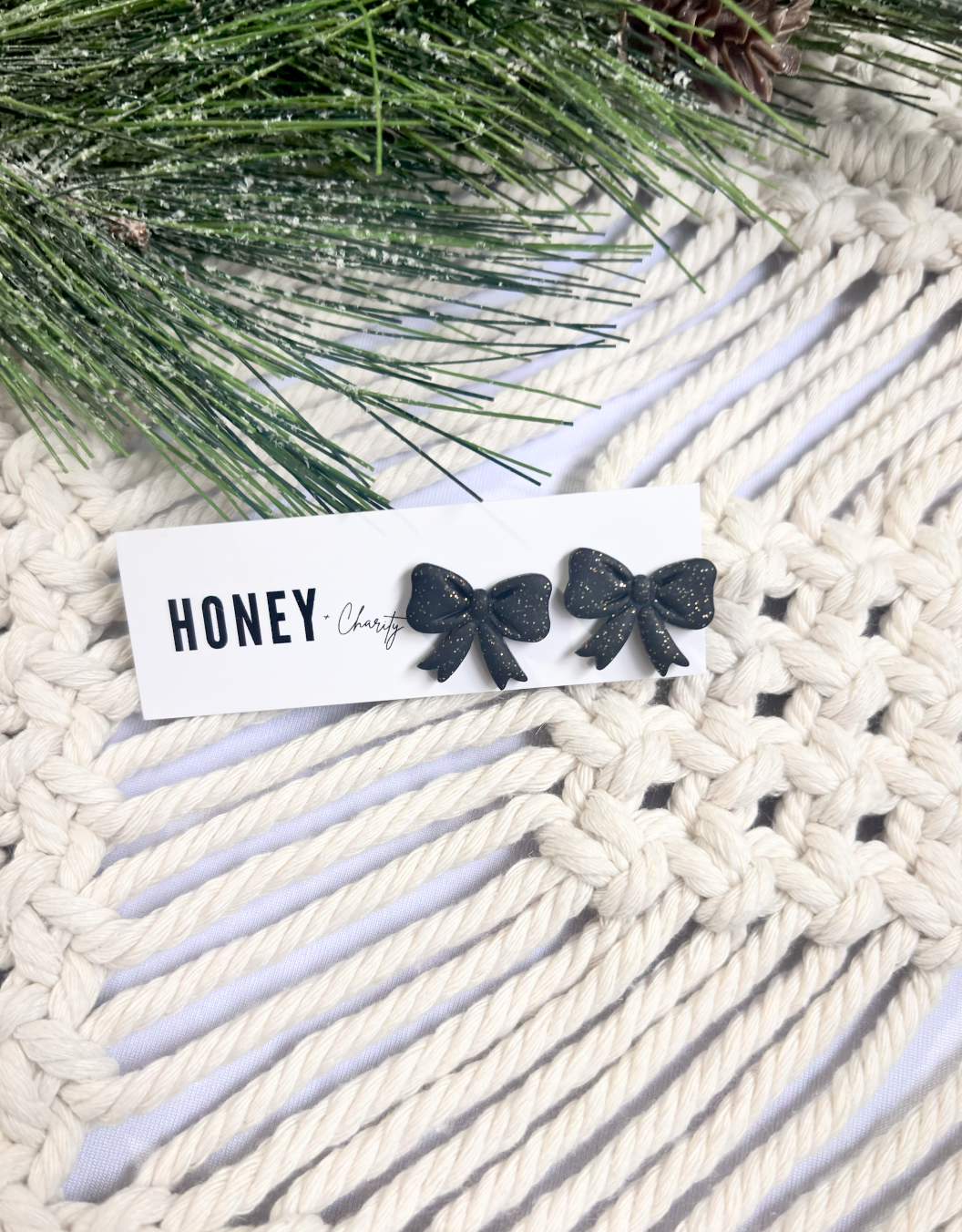 Black Sparkle Bow Studs